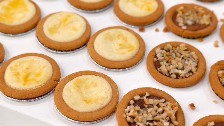 Tray of different flavored cheese tarts