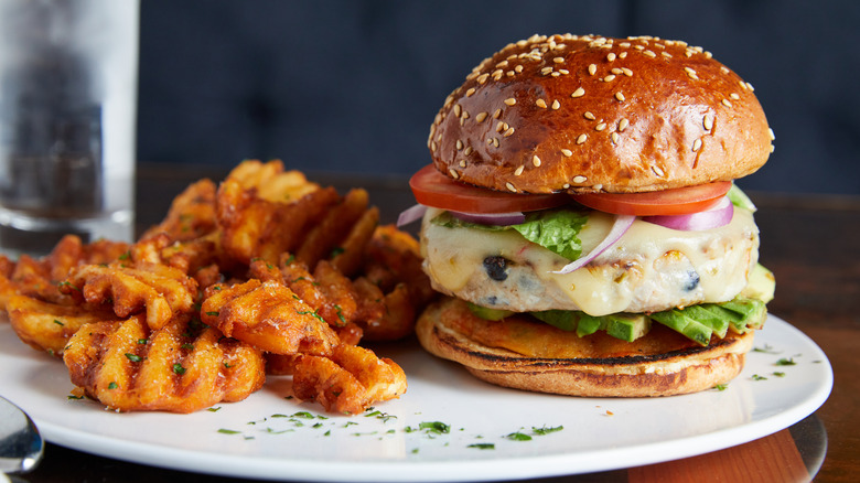 a turkey burger and waffle fries