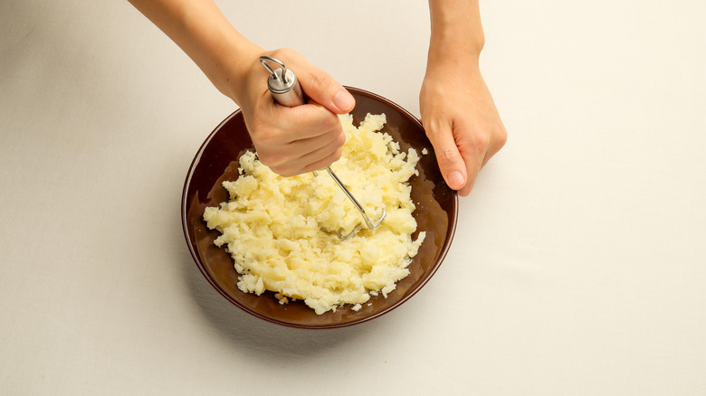 Mashing potatoes
