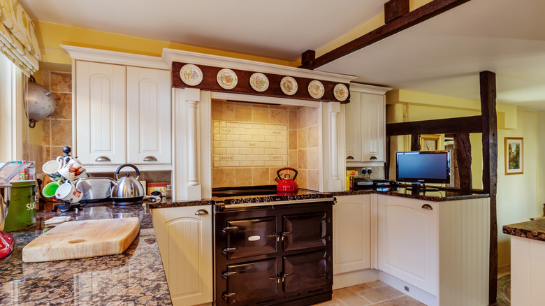 Traditional kitchen with stove cove