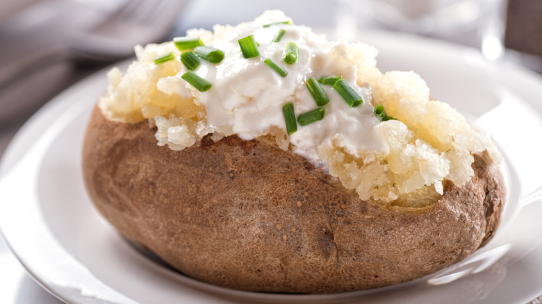 baked potato with blue cheese dressing and chives