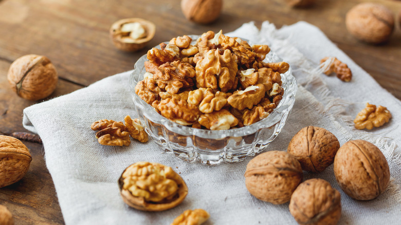 Glass bowl of walnuts
