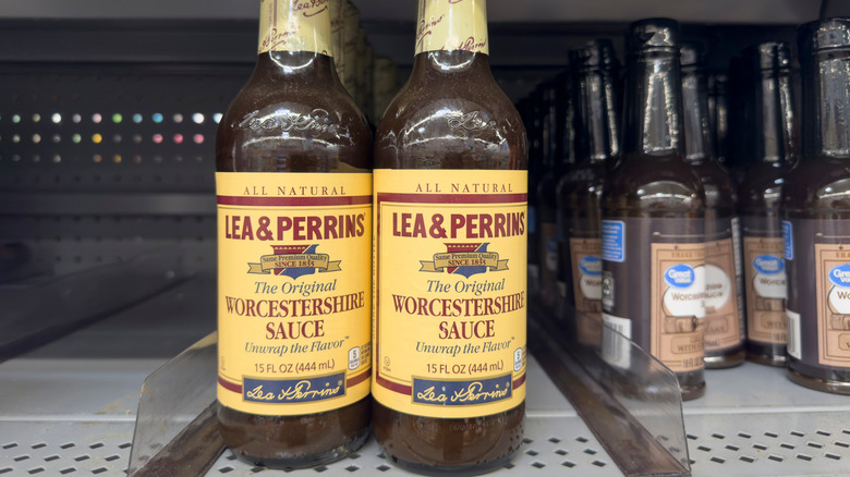 Bottles of Worcestershire sauce are seen on a store shelf.