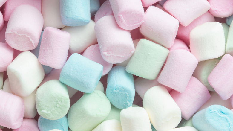Colorful marshmallows background close up.