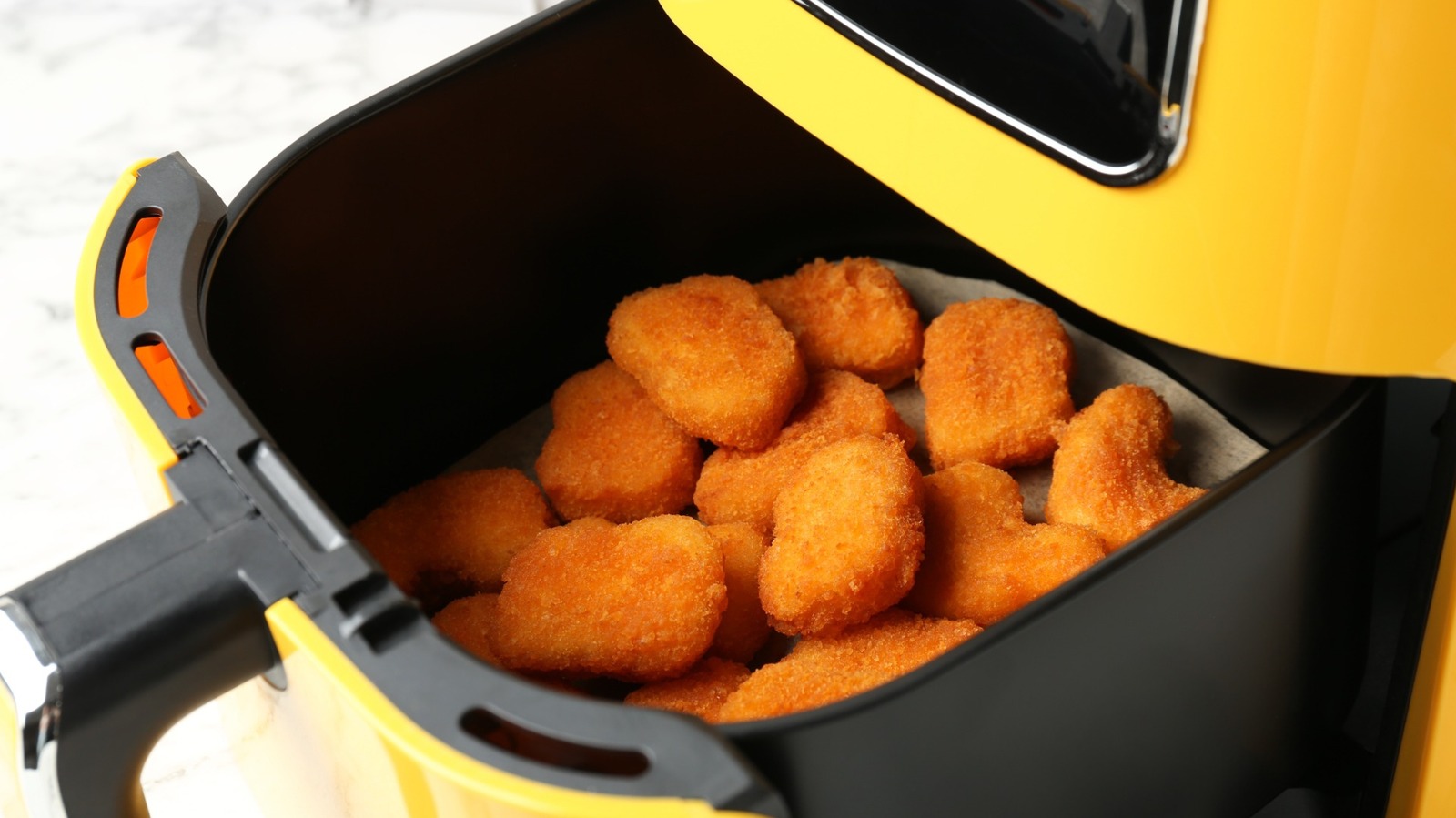 The Air Fryer Myth That's Leaving You With Sad, Lackluster Meals