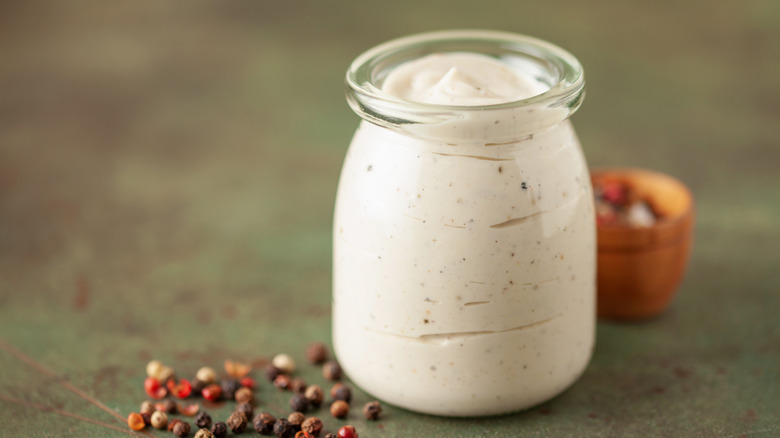 alabama white barbecue sauce in a glass jar