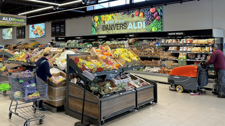 Inside an Aldi store where shelves are stocked with goods.