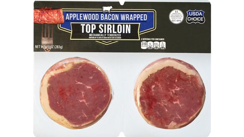 Two chunks of sirloin in clear packaging