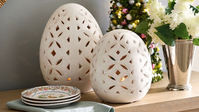 Pottery Barn's rustic Easter egg cloche is a white piece of decor.