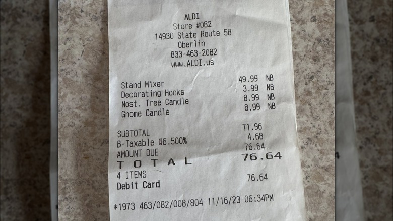 Aldi receipt with warranty information.
