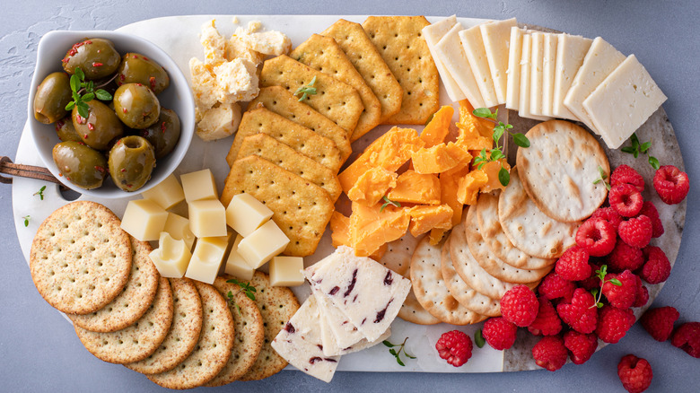 Assorted crackers on a charcuterie board