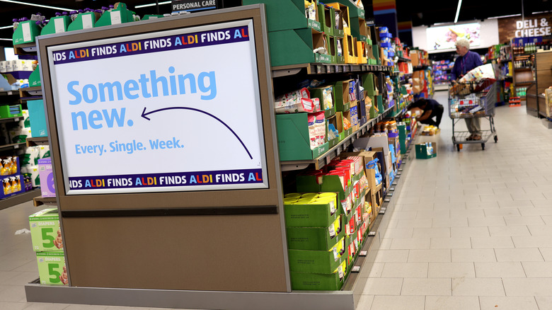 An older gentleman shopping nearby the Aldi Finds aisle.