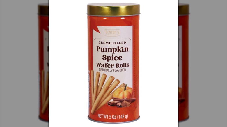 A can of pumpkin spice wafer rolls, with an orange background.