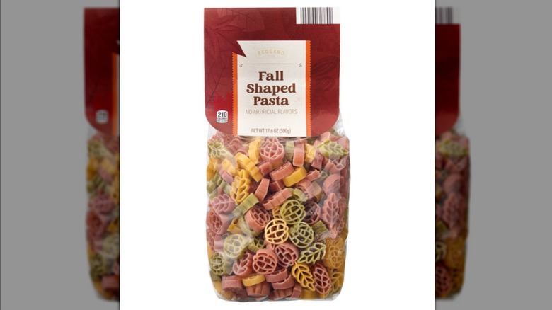 A clear packaging showing a colorful array of fall-shaped pasta.