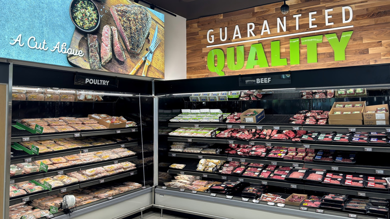 Meat section at Aldi under "Guaranteed Quality" sign
