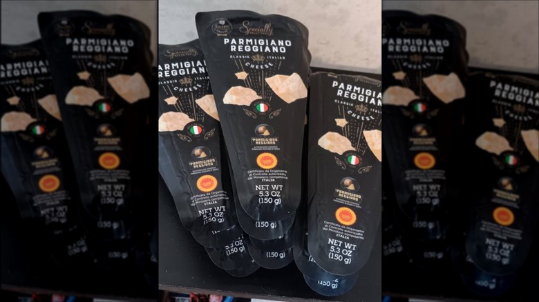 Wedges of packaged Specially Selected Parmigiano Reggiano Cheese