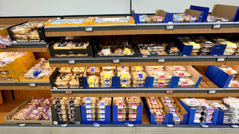 Bakery section filled with various products at Aldi store.