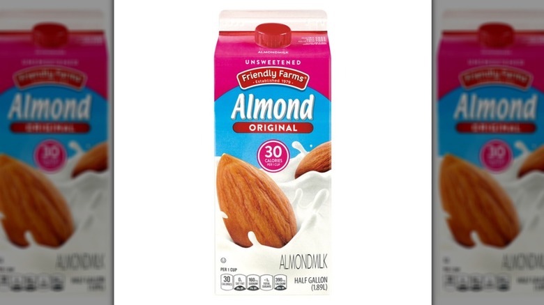 A carton of Aldi's Friendly Farms Unsweetened Almondmilk