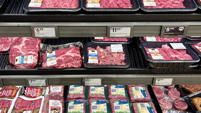 Beef cuts on display at Aldi meat department.