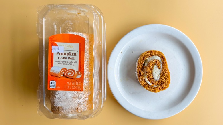 Pumpkin cake roll on a yellow background