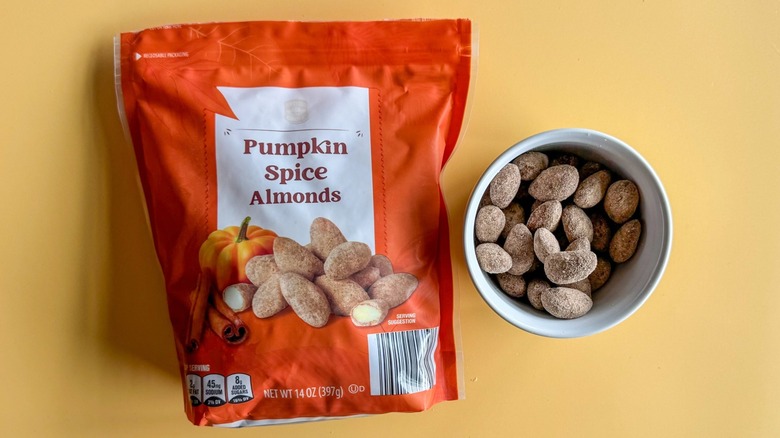 Pumpkin spice almonds in a dish with packaging
