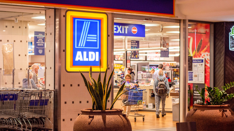 View of customers at checkout inside Aldi