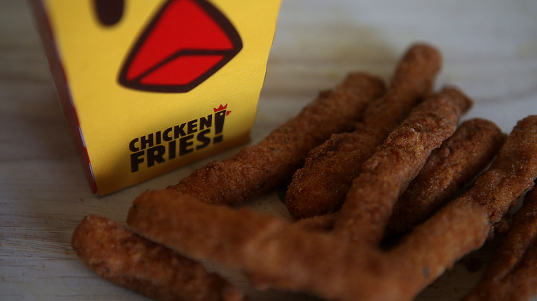 Chicken fries displayed in front of a box