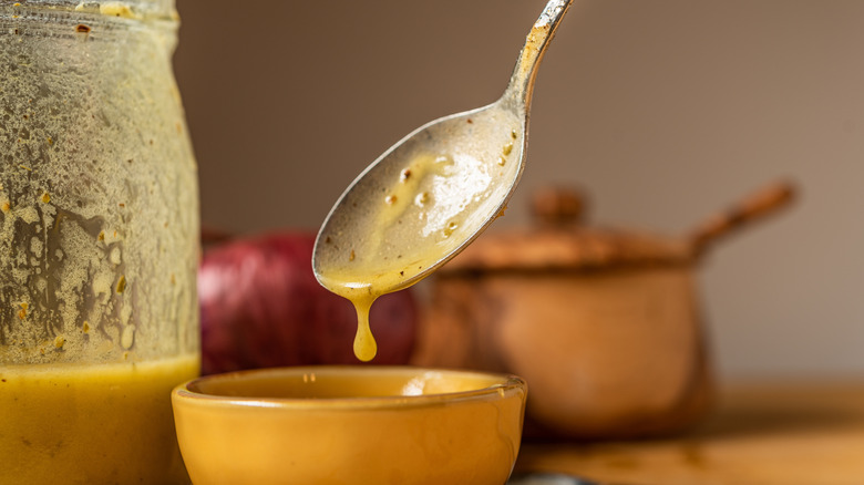 olive oil, red wine vinegar, and mustard salad dressing