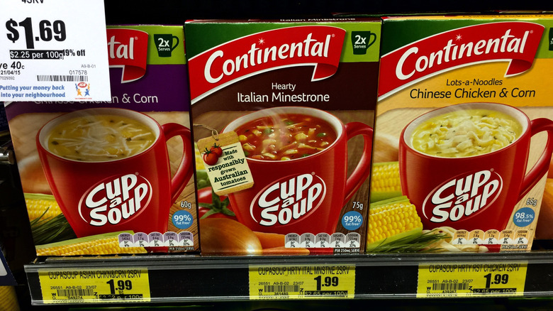 Soup packets are arranged on a shelf