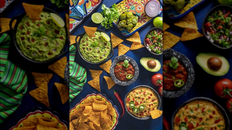 Various salsas and dips with tortilla chips.