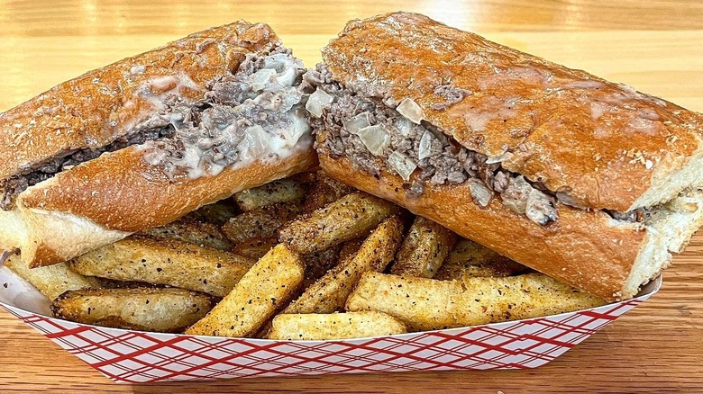A Philly cheesesteak with fries at Fred's Meat & Bread in Atlanta, Georgia