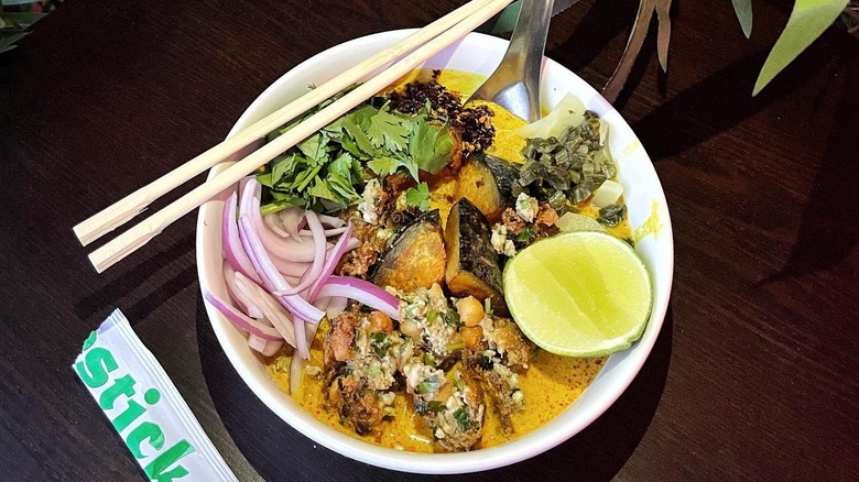 A bowl of Khao Soi noodles at Night + Market in Los Angeles