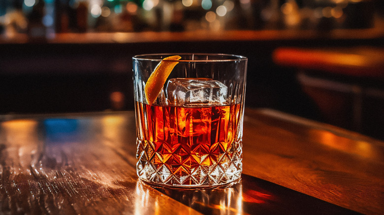 An old fashioned cocktail on a bar
