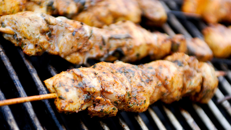 Chicken skewers on grill