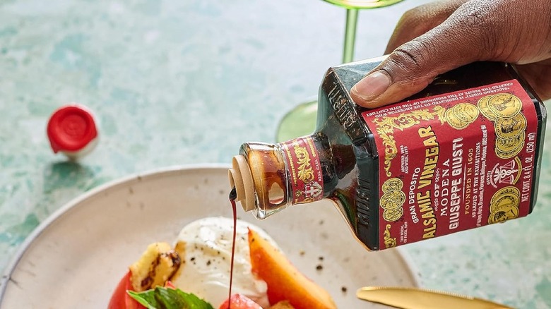 Balsamic vinegar pouring