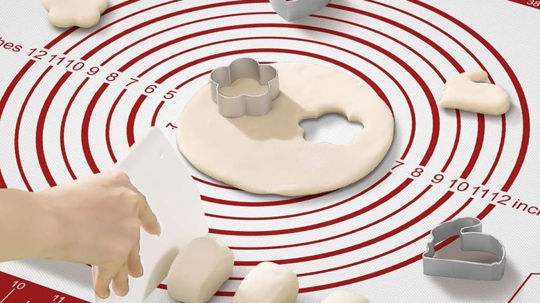 large baking mat with dough on it