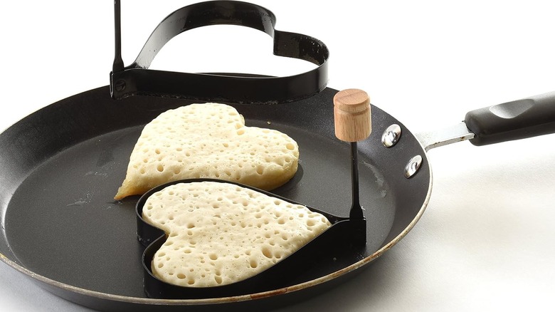 heart-shaped pancakes in pan