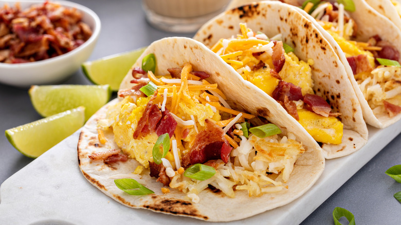 eggs, cheese, and bacon in a taco
