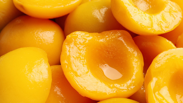 Close-up of halved peaches from a can