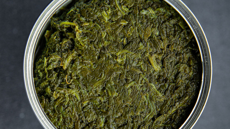 Close-up of an opened can of spinach