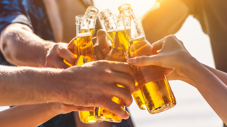 pouring beer into glass