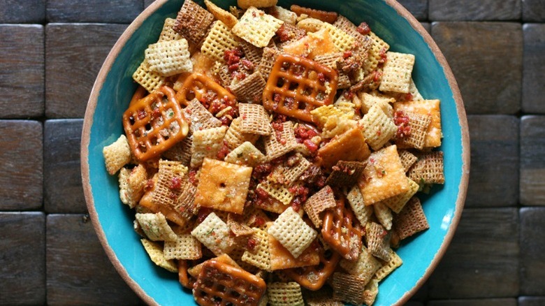 Bowl of Chex Mix with bacon pieces
