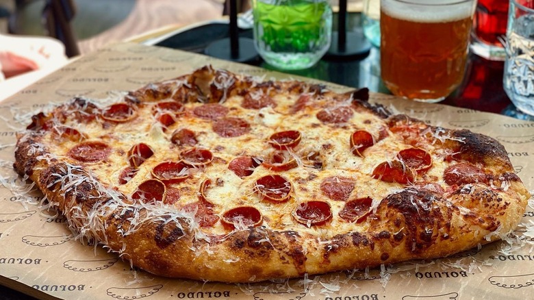 A diamond-shaped pizza on a table at Boludo in Minneapolis