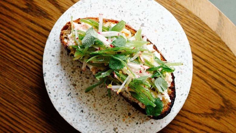 A king crab tartine on bread from Mara in Minneapolis