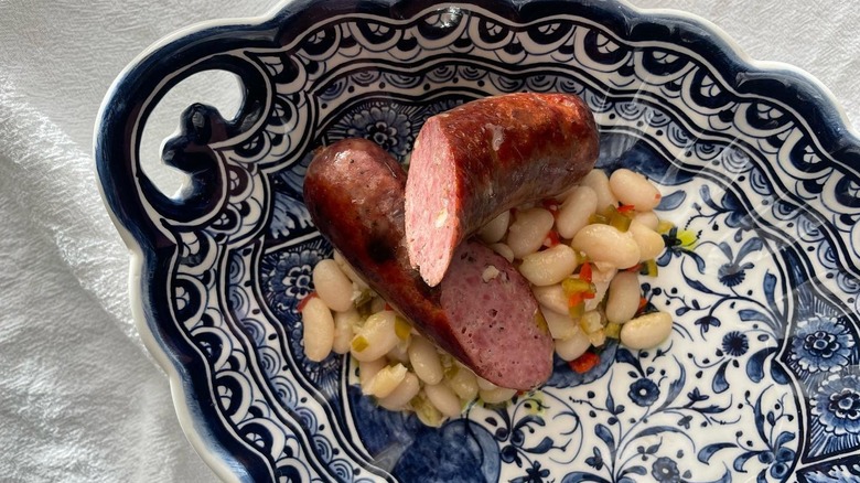 A plate of sausage and white beans from Myriel in Minneapolis