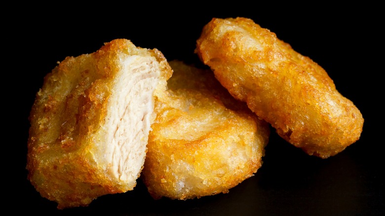 Chicken McNugget sliced open and stacked