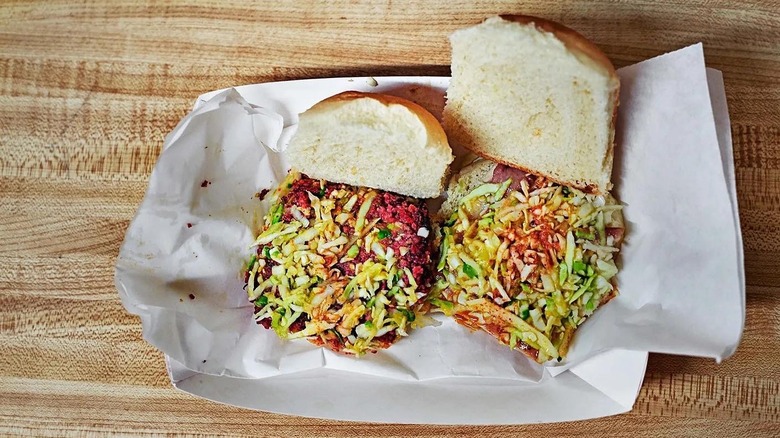 Two smoked sausage sandwiches with coleslaw from The Big Apple Inn in Jackson
