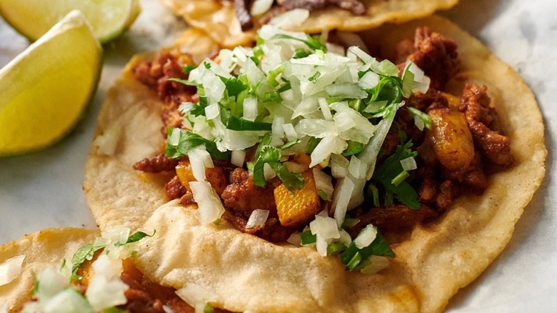 A close-up of a carnitas taco from El Taco Veloz in Atlanta
