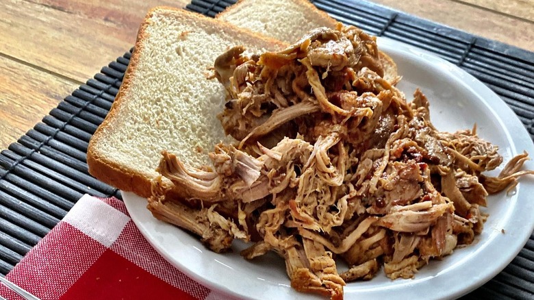 A plate of pulled pork with white bread from Scott's Bar-B-Que