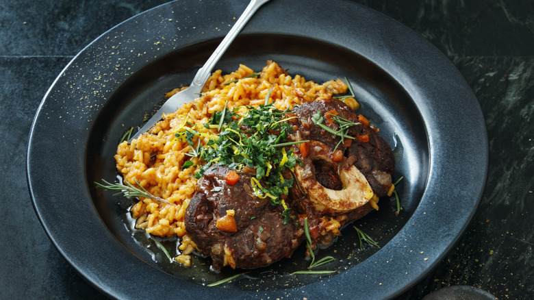 Traditional osso buco served over saffron risotto
